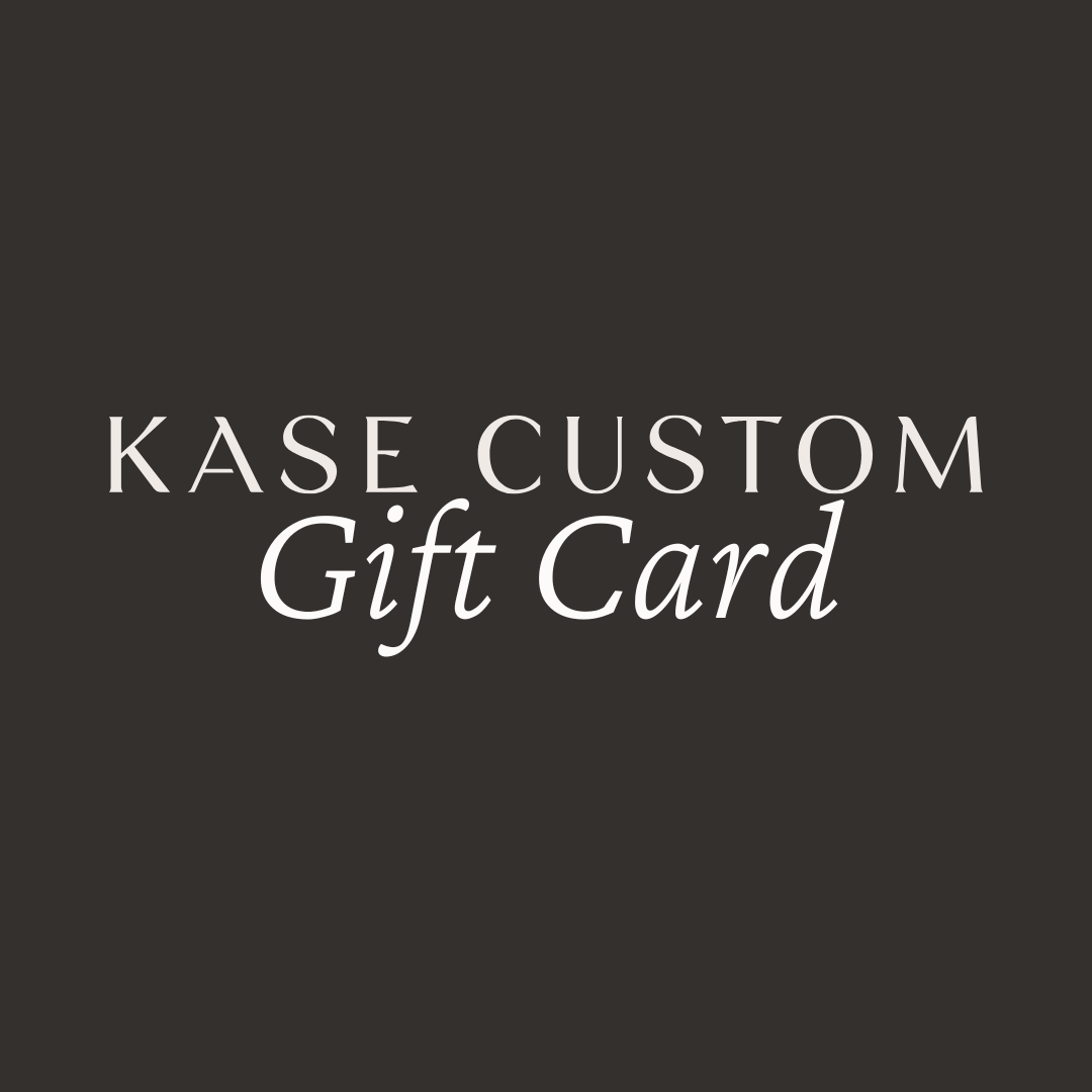 Text on a dark background reads Kase Custom Gift Card in a refined, elegant font, evoking the quality of handcrafted Arizona reclaimed wood furniture—a thoughtful, customizable gift for bar table or kitchen island enthusiasts.