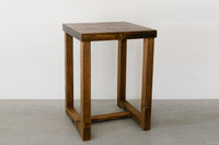 Handcrafted in Arizona, this bar-height table and matching wooden stool showcase enduring quality with a natural brown finish. Made from sustainable reclaimed wood, perfect as a narrow bar table or kitchen island.
