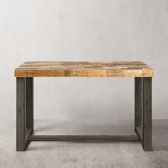 Reclaimed wood bar table in Natural finish against grey wall