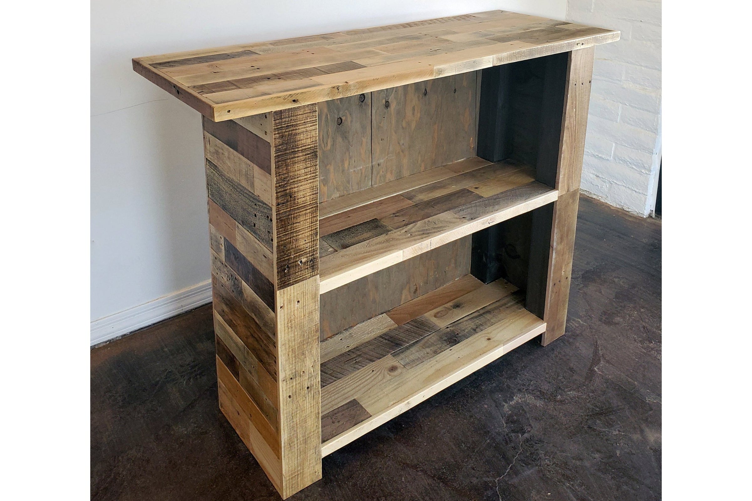 Handcrafted in Arizona, this narrow reclaimed wood furniture piece features a rectangular top, two open shelves, and rich natural grain—ideal as a custom bar table, counter-height island, or unique restaurant table.