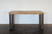 This handcrafted bar-height table features a rectangular reclaimed wood top and four sturdy legs, showcasing enduring quality and sustainable materials. Perfect as a narrow kitchen island or restaurant table, made in Arizona.