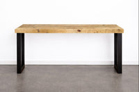 The Gunnison Steel Leg bar-height table features a robust, blonde reclaimed wood top and black steel legs, blending sustainability with timeless craftsmanship. Ideal as a narrow kitchen island or restaurant table. Handcrafted in Arizona.