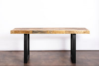 Handcrafted in Arizona, this rustic dining table features a thick reclaimed wood top and sturdy black steel legs. Perfect as a bar-height or restaurant table, it blends sustainable materials with lasting quality.