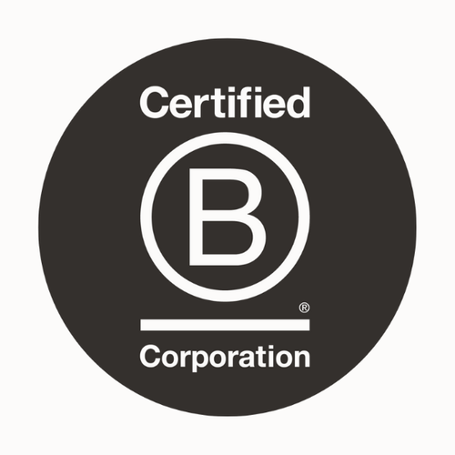 Black circle logo featuring a bold B within a ring. 'Certified' arches above and 'Corporation' sits below, symbolizing B Corporation certification—an emblem of enduring quality and sustainable craftsmanship in every bar-height table.