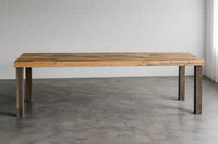 Extra-long custom reclaimed wood dining table in Natural finish. Seats up to 14. Handcrafted in Arizona. 