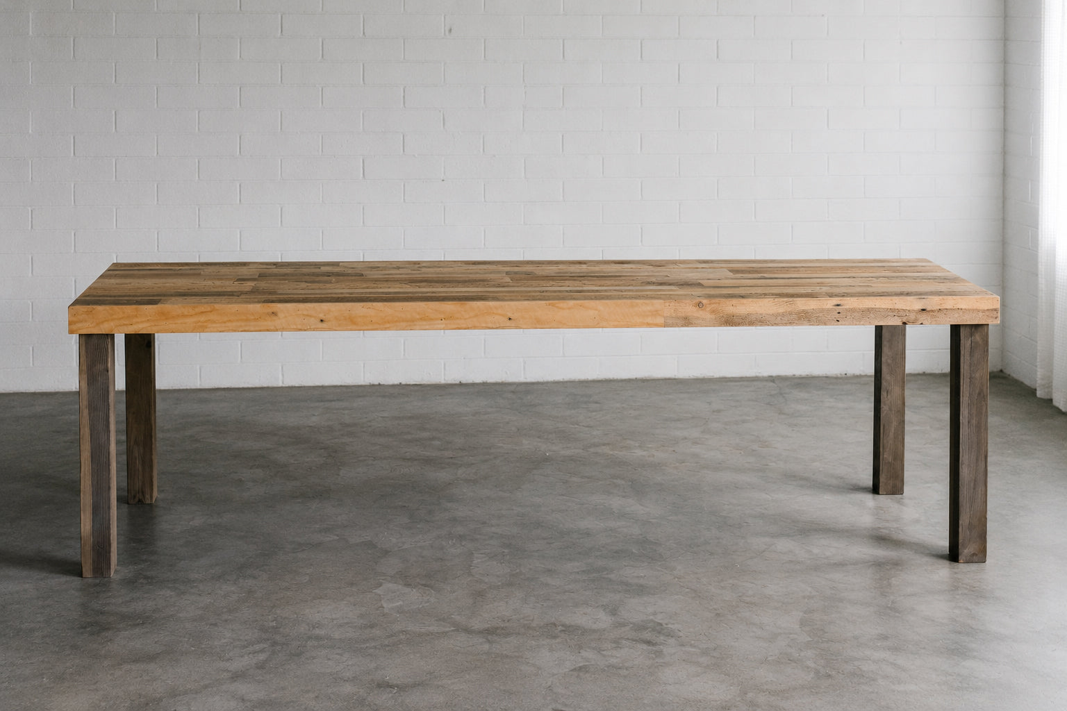 Extra-long custom reclaimed wood dining table in Natural finish. Seats up to 14. Handcrafted in Arizona. 