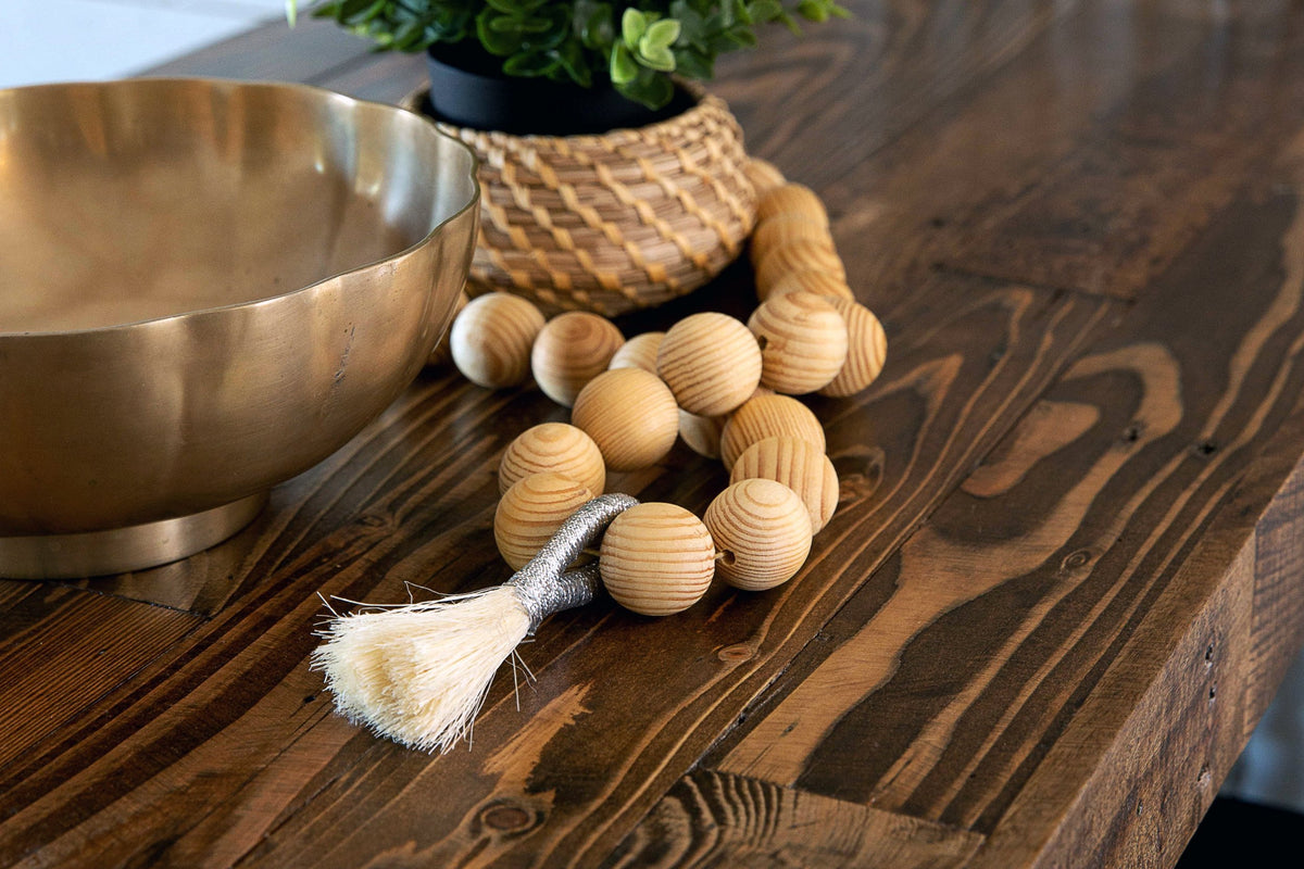 Tabletop decor accents a handmade reclaimed wood table in Provincial finish. Built by Kase Custom in Arizona.