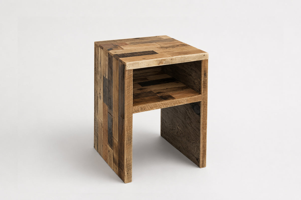 Wooden side table handmade with solid reclaimed wood in Arizona. Shown on a white background.