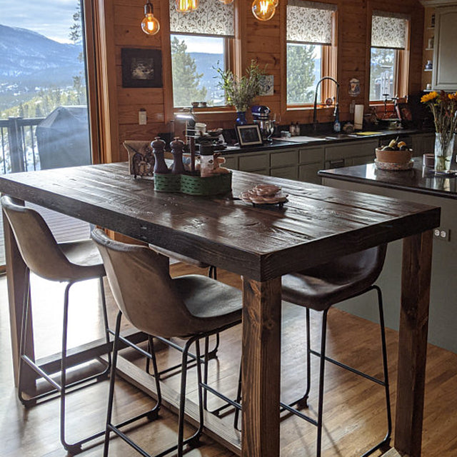 beautiful reclaimed wood table in mountain home