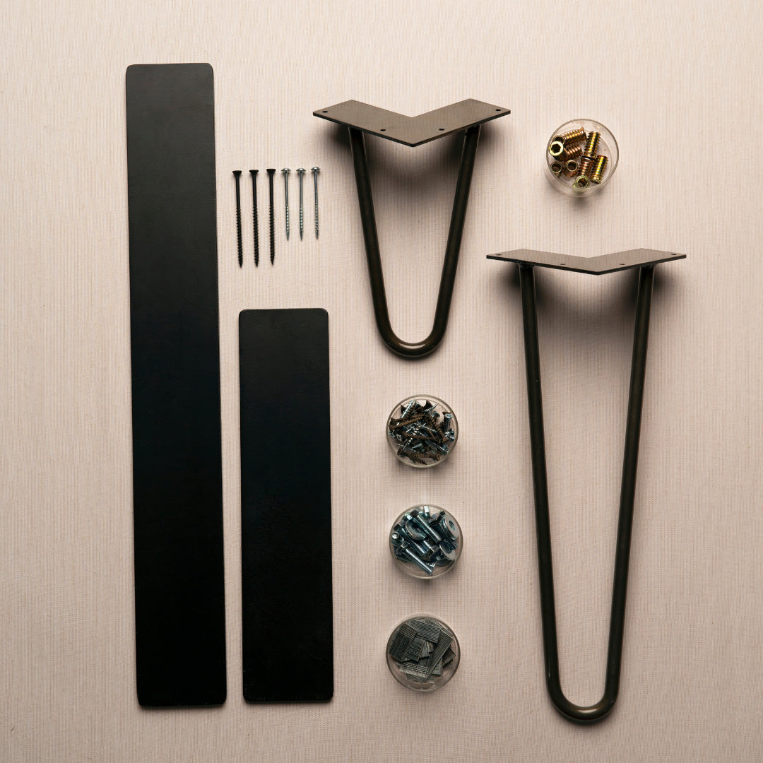 Expertly crafted black steel hairpin table legs with durable mounting plates and organized hardware—ideal for creating a custom bar-height table, kitchen island, or narrow counter-height dining space with reclaimed wood.