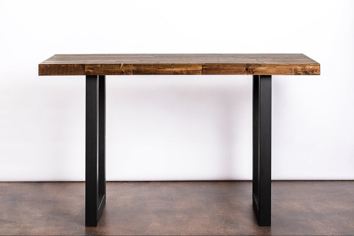 Expertly handcrafted in Arizona, this bar-height table features a thick reclaimed wood top and sturdy steel legs. Perfect as a kitchen island, counter-height table, or narrow dining solution for home or restaurant use.
